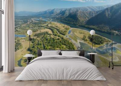 A beautiful landscape with a river running through it Wall mural