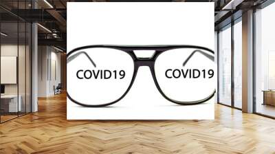 black glasses on a white background with the inscription COVID19 Wall mural