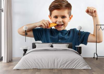 child boy eating healthy food and showing his strength isolated with white highlights, png Wall mural