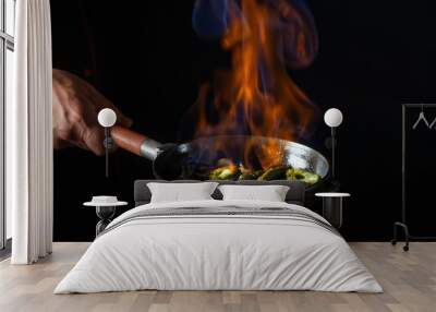 Cooking food with fire flame. Hotel service and restaurant concept. Wall mural