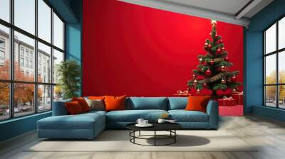 Decorated Christmas tree with gifts under the tree, red solid background Wall mural