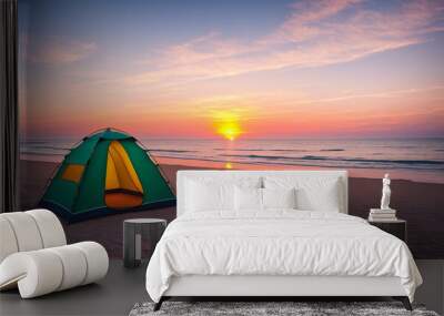 A tourist tent stands on the beach against the background of the ocean during sunset or dawn. Generative AI. Wall mural