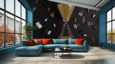 Hourglass with office accessories. Business, work. Black style, concept of running out of time Wall mural