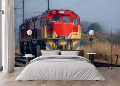 Red Diesel Electric Locomotive on a sunny day Wall mural