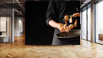 Seafood, Professional cook prepares shrimps with sprigg beans. Cooking seafood, healthy vegetarian food and food on a dark background. Horizontal view. Eastern kitchen Wall mural