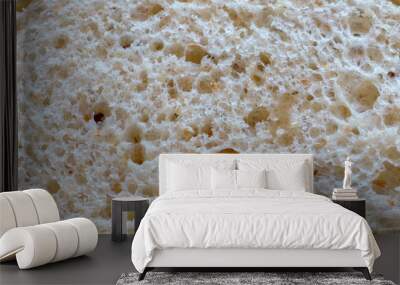 The structure of natural organic porous bread for the background, macro shot Wall mural