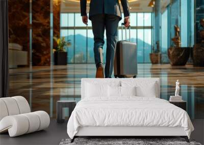 Walking With Suitcase. Caucasian Businessman Walking Alone in Hotel Lobby, Confidently Wall mural