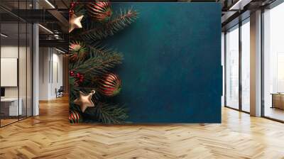 Fir branch with Christmas decoration on a  dark blue-green painted wooden background.  Flat lay.  New Year and Christmas  background. Wall mural