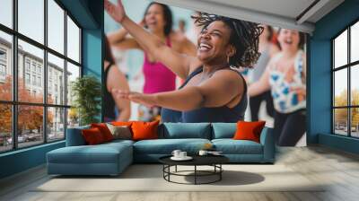 A joyful woman dancing energetically in a lively group fitness class, exuding happiness and enthusiasm. Wall mural