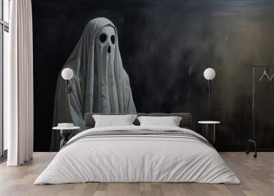 a man in a white costume stands in front of a black background with a spooky ghost on it. Wall mural