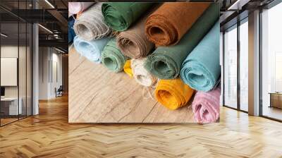 Colorful linen fabric in rolls, textile indistry Wall mural