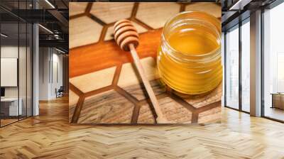 Golden natural honey with dipper Wall mural