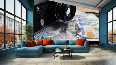 earnings in photography, a camera and money (dollars) are on the table Wall mural