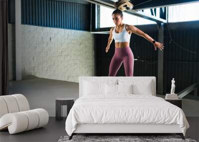 Active woman exercising in a high-intensity interval training Wall mural