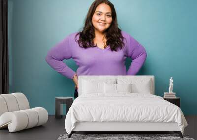 Beautiful obese woman smiling making eye contact Wall mural