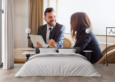 Businessman flirting with his coworker Wall mural