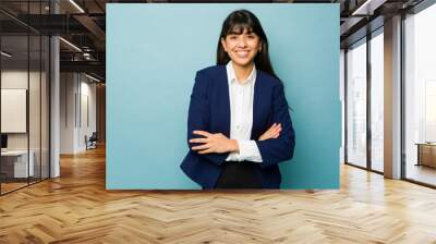 Businesswoman looking confident and successful smiling Wall mural