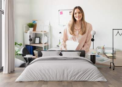 Female assistant ready to work in an office Wall mural