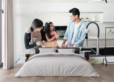 Girl Learning To Make Cookies With Family In Kitchen Wall mural