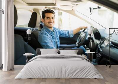 Handsome man in his car Wall mural