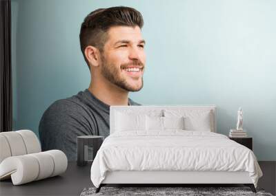 Happy Male With Stubble In Studio Wall mural