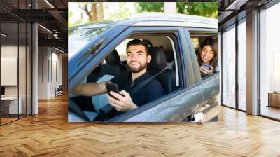 Portrait of a male driver and a young woman Wall mural