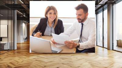 Sales executives working together in a hotel Wall mural