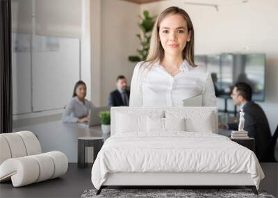 Young businesswoman in office conference room Wall mural