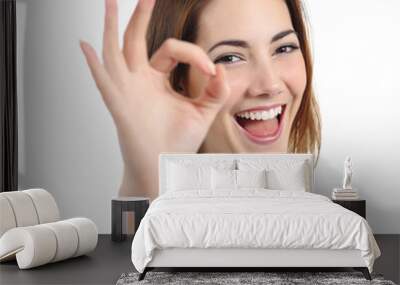 Close up of a happy woman making ok gesture Wall mural