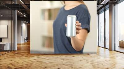 Closeup of a woman hand holding a soda drink can Wall mural