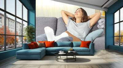 Disabled woman resting happy at home Wall mural