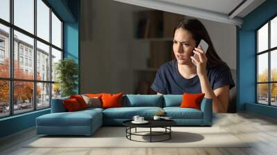 Frustrated woman claiming on the phone in the night Wall mural