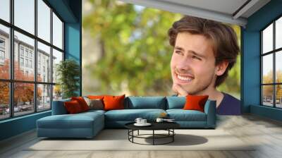 Happy man thinking outdoor Wall mural