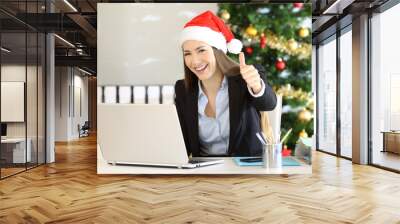 Office worker with thumbs up in christmas Wall mural