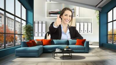 Proud office worker posing with thumbs up Wall mural