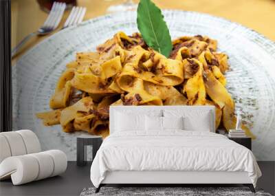 Dish with tagliatelle with wild boar meat sauce Wall mural