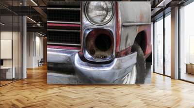 Headlight of old retro car with rust on bodywork, recovery of vintage automobile, selective focus  Wall mural