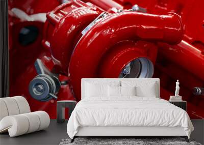 Turbocharger of red powerful engine, turbine of diesel motor for oversize trucks, SUV, cargo, commercial and construction vehicles, heavy industry, detail  Wall mural