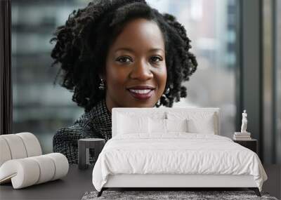 a confident professional woman with natural hairstyles, wearing elegant business attire Wall mural