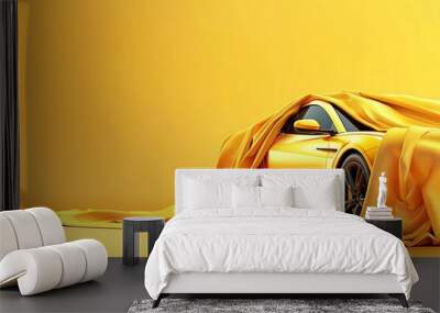 A modern car partially revealed under a draped silk cloth, vibrant yellow background Wall mural