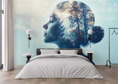 Double exposure of woman's head with forest silhouette, symbolizing nature and self-connection Wall mural