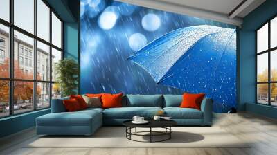 Rainy day with blue umbrella and bokeh effect, close-up with dark background Wall mural