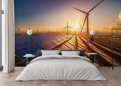 renewable energy landscape with wind turbines and solar panels at sunset Wall mural