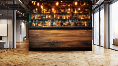 Empty wooden table top with a blurred bokeh background of a night bar interior Wall mural