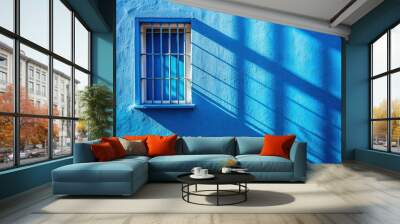 Abstract background with window shadows on blue wall with Depth of Field Wall mural