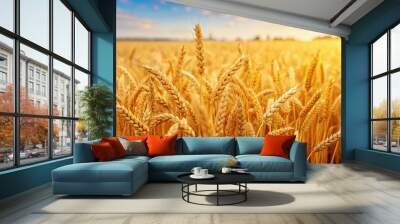 Field of golden wheat ready for harvest in a farm field silhouette Wall mural