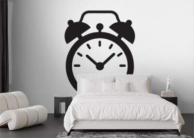 A icon of a classic alarm clock silhouette. Wall mural