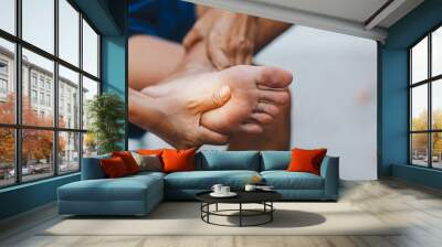 young woman pain in her foot Wall mural