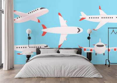 Passenger plane flying in the sky side view. travel concept Wall mural