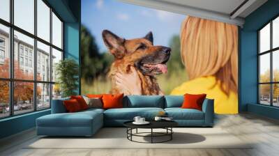 German shepherd and a girl Wall mural